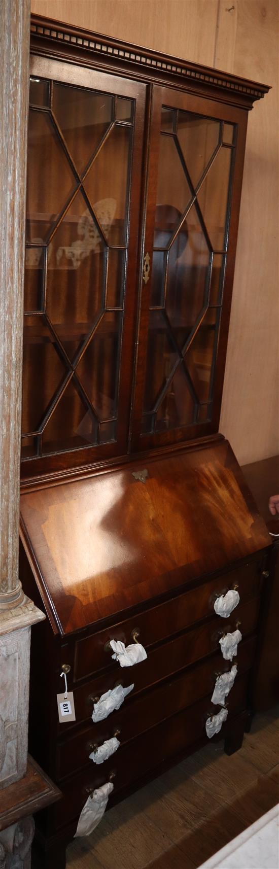 A reproduction Georgian style mahogany bureau bookcase W.75cm